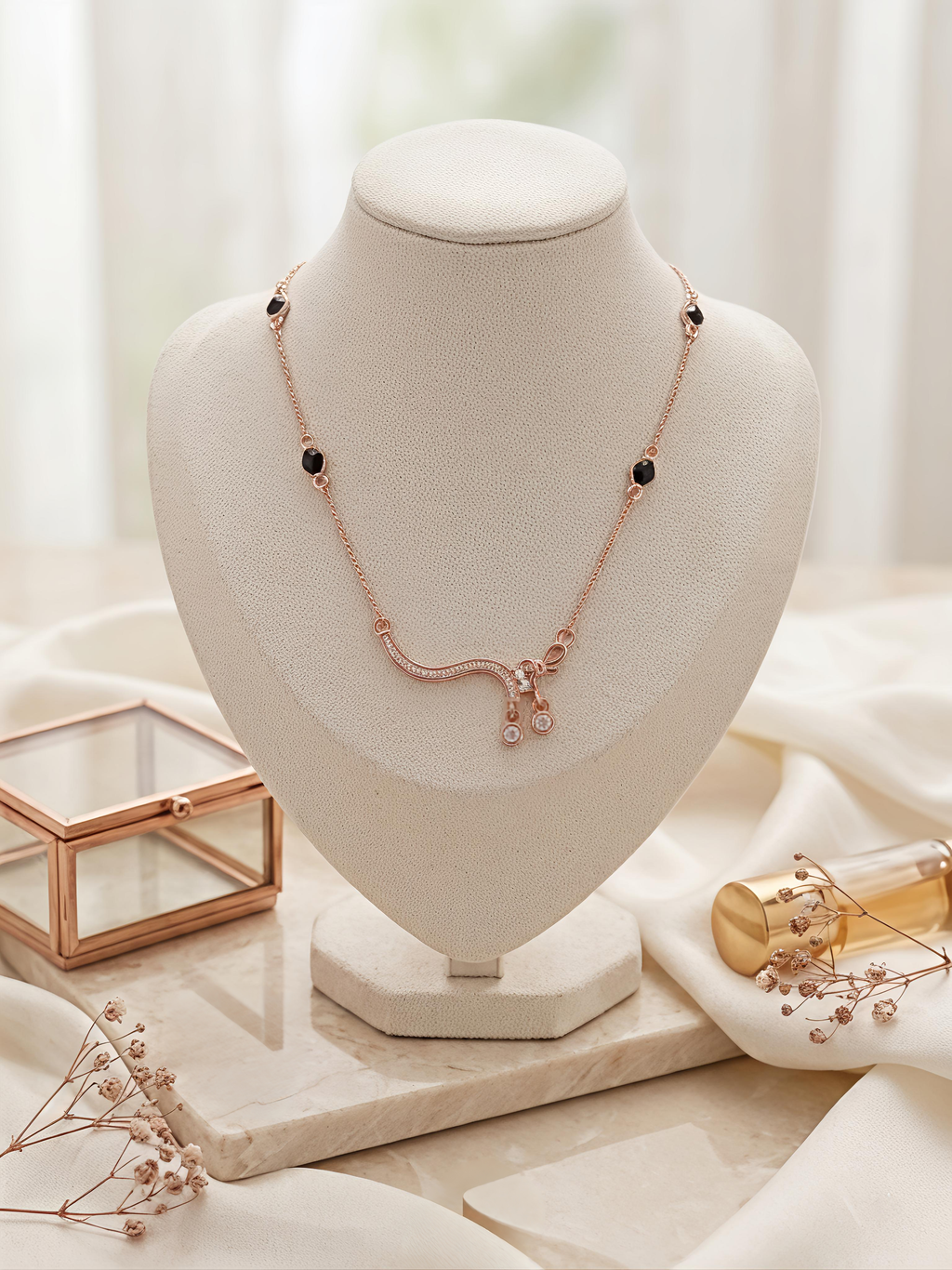 Rose Gold Curved Crystal Wave Necklace with Black Bead Accents